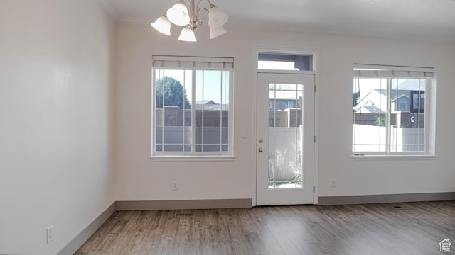 635 E 60 S Unit A-3, American Fork, UT 84003 - entryway with healthy amount of natural light, ornamental molding, wood finished floors, and a ceiling fan
