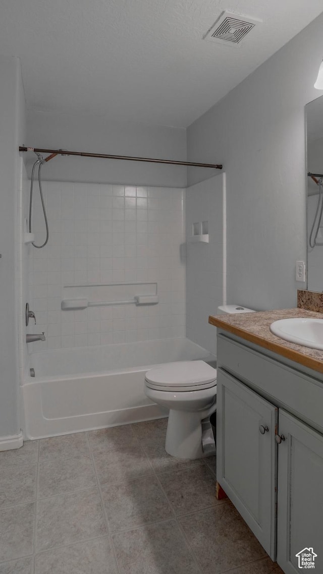 635 E 60 S Unit A-3, American Fork, UT 84003 - bathroom featuring tile patterned floors, toilet, vanity, and tub / shower combination