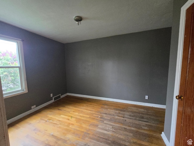 616 Jefferson St, Montpelier, ID 83254 - empty room featuring wood finished floors and baseboards