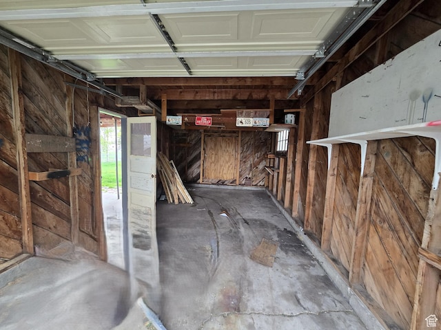 616 Jefferson St, Montpelier, ID 83254 - garage featuring wooden walls