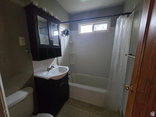 616 Jefferson St, Montpelier, ID 83254 - bathroom featuring toilet, shower / bath combination with curtain, backsplash, vanity, and tile patterned floors
