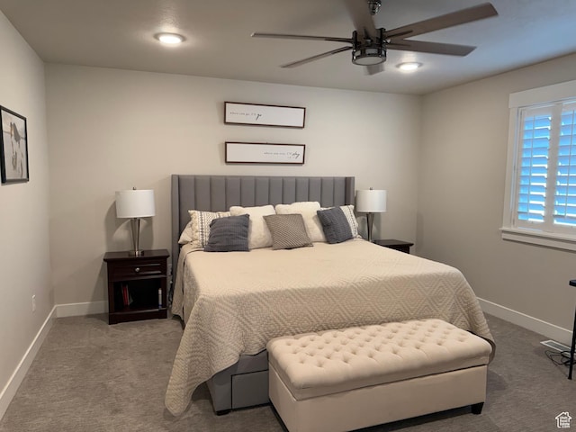 bedroom featuring carpet floors, baseboards, and ceiling fan