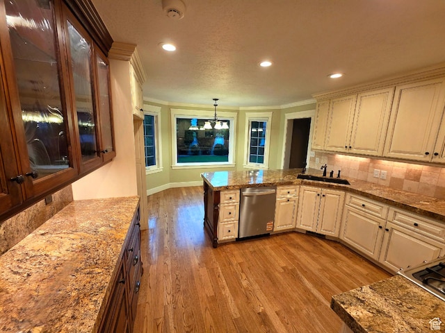 242 W 1100 S, Orem, UT 84058 - kitchen with dishwasher, a sink, light wood-type flooring, recessed lighting, and decorative backsplash