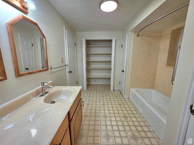242 W 1100 S, Orem, UT 84058 - bathroom featuring vanity, tile patterned floors, and tub / shower combination