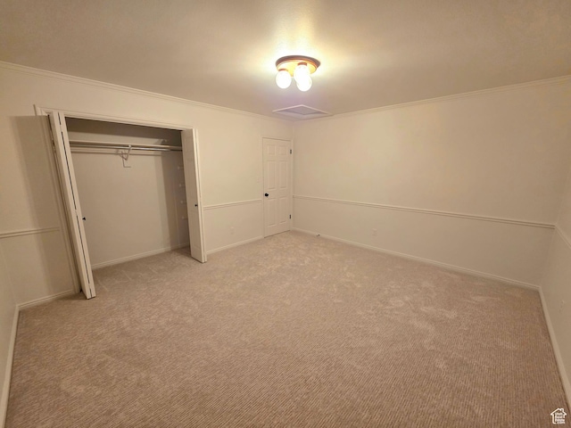 242 W 1100 S, Orem, UT 84058 - unfurnished bedroom with crown molding, light carpet, a closet, and baseboards