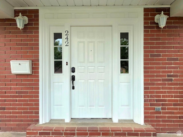 242 W 1100 S, Orem, UT 84058 - property entrance featuring brick siding