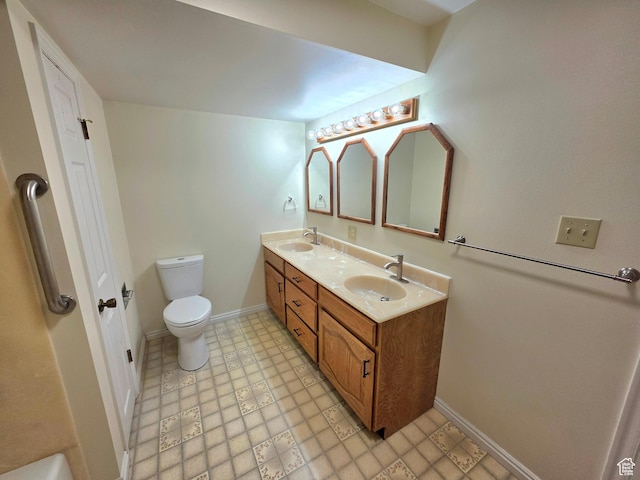242 W 1100 S, Orem, UT 84058 - full bath with double vanity, toilet, baseboards, and tile patterned floors