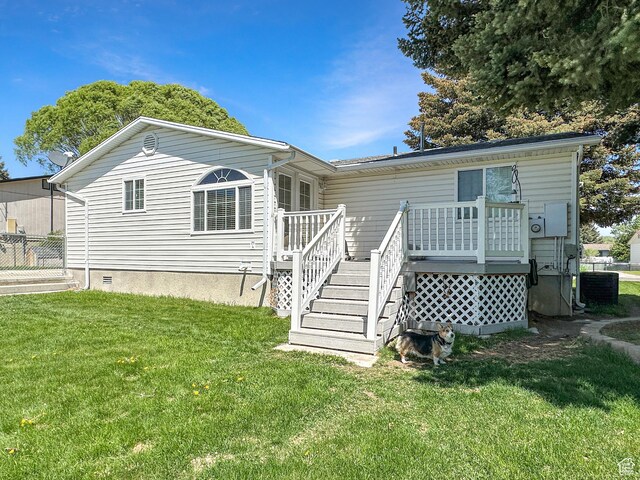 415 N Cedar Vw, Orangeville, UT 84537 - rear view of property featuring a deck, a yard, central AC, crawl space, and stairway