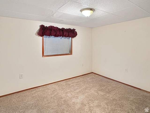 415 N Cedar Vw, Orangeville, UT 84537 - empty room featuring carpet, a paneled ceiling, and baseboards