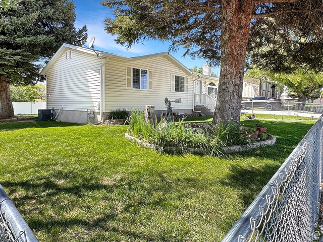 415 N Cedar Vw, Orangeville, UT 84537 - view of front of property with cooling unit and a chimney