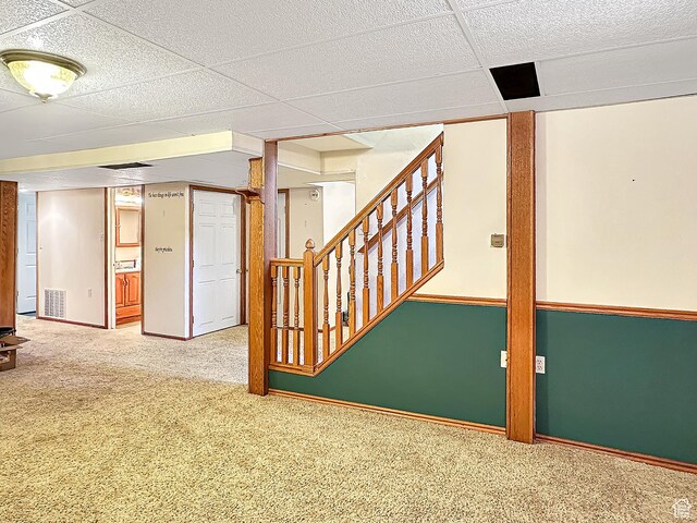 415 N Cedar Vw, Orangeville, UT 84537 - finished below grade area with carpet flooring, stairs, and a paneled ceiling