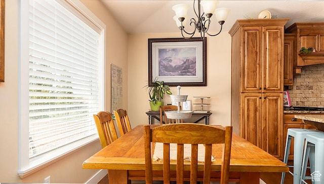 1136 S 4425 W, Cedar City, UT 84720 - dining space featuring plenty of natural light, a chandelier, and baseboards