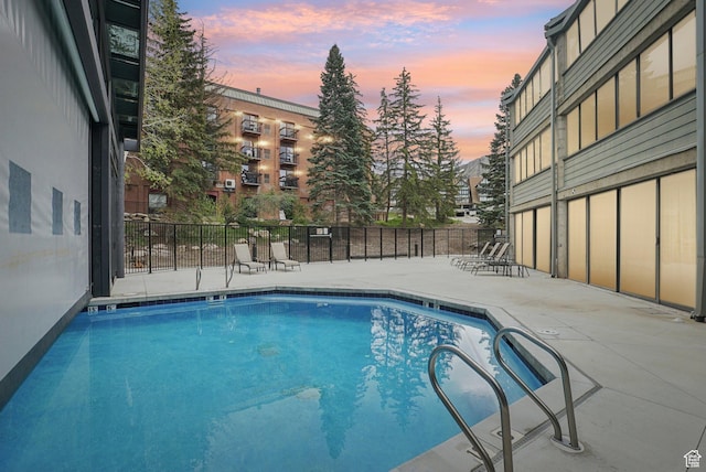 community pool featuring a patio area