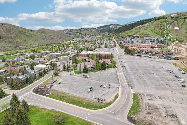 aerial view of property's location featuring mountains