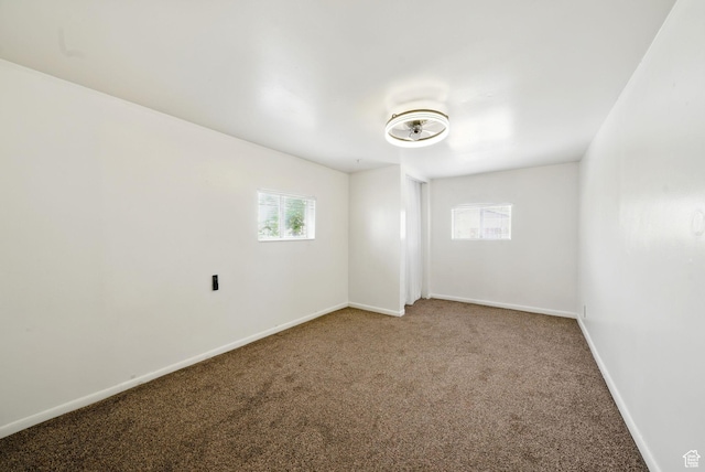 653 E Hollywood Ave, Salt Lake City, UT 84105 - carpeted spare room featuring healthy amount of natural light and baseboards