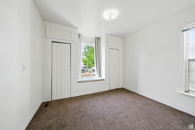 653 E Hollywood Ave, Salt Lake City, UT 84105 - unfurnished bedroom with carpet, baseboards, and a closet