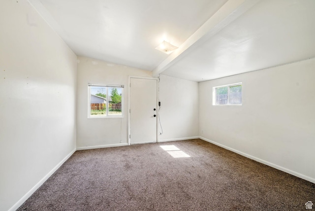 653 E Hollywood Ave, Salt Lake City, UT 84105 - spare room with carpet floors, lofted ceiling, and baseboards