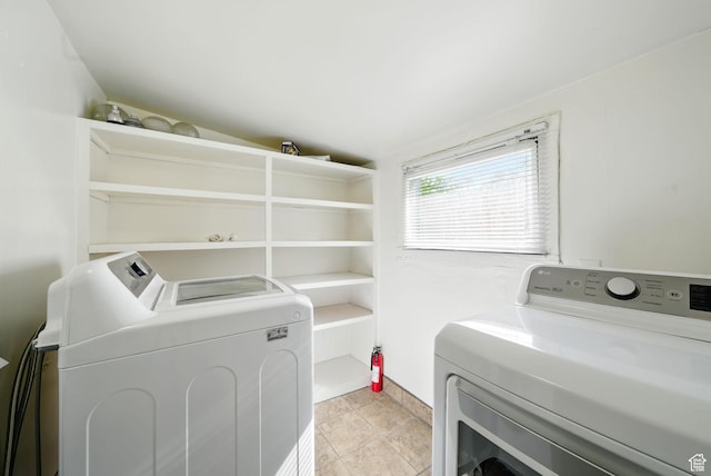 653 E Hollywood Ave, Salt Lake City, UT 84105 - laundry room featuring washing machine and clothes dryer and light tile patterned floors