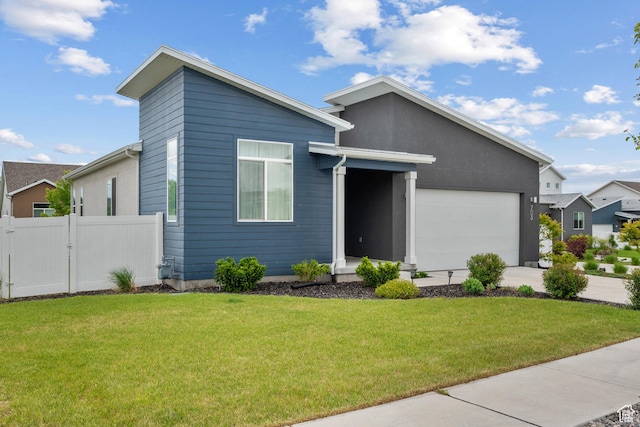 703 W Swinley Dr, Murray, UT 84123 - view of front of property with a garage, concrete driveway, and a gate