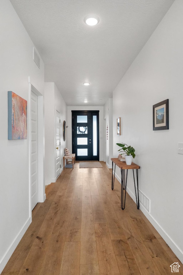 703 W Swinley Dr, Murray, UT 84123 - foyer with wood-type flooring, baseboards, and recessed lighting