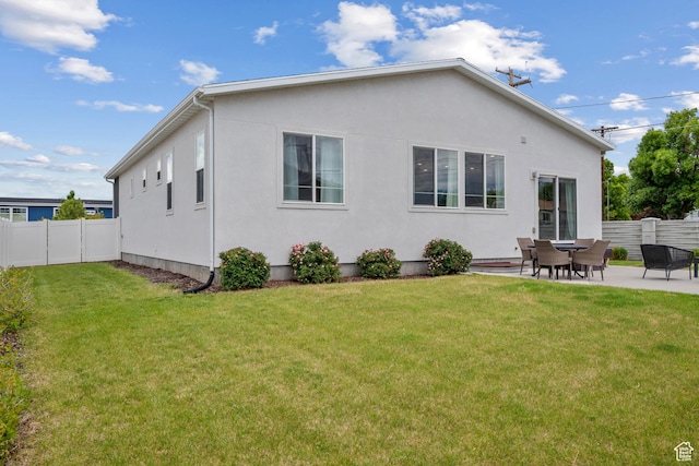 703 W Swinley Dr, Murray, UT 84123 - back of house featuring a patio area and stucco siding