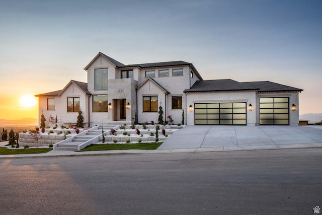 1171 E 430 S, Santaquin, UT 84655 - view of front of home featuring a garage, driveway, and brick siding