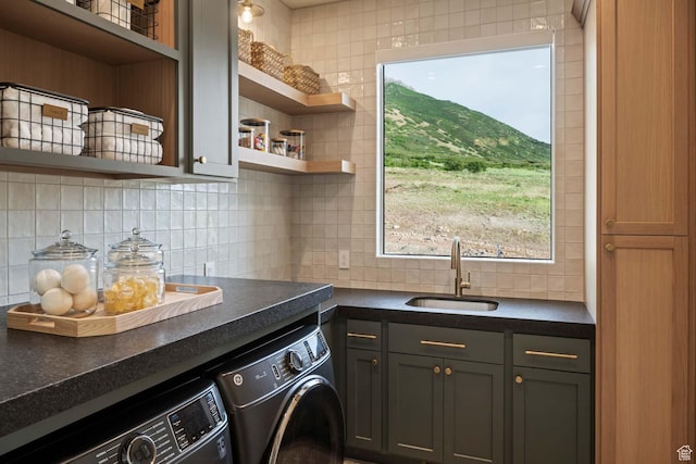 1171 E 430 S, Santaquin, UT 84655 - laundry room featuring independent washer and dryer, cabinet space, plenty of natural light, and a mountain view