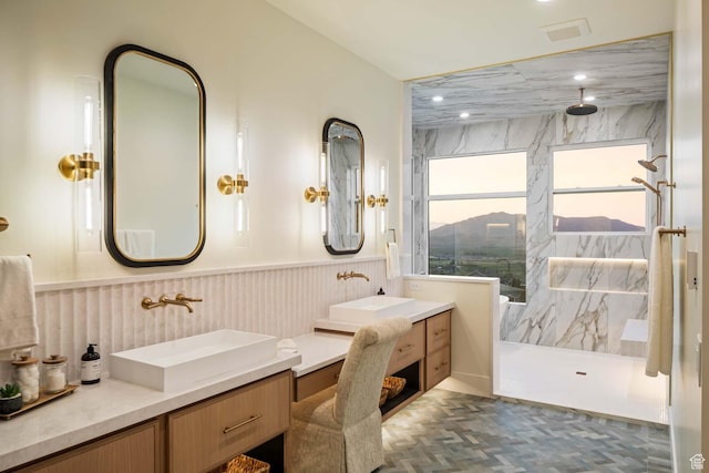 1171 E 430 S, Santaquin, UT 84655 - bathroom with vanity, a marble finish shower, and a wainscoted wall