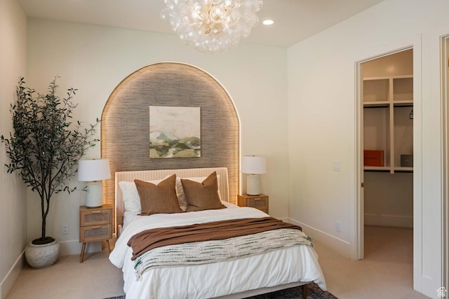 1171 E 430 S, Santaquin, UT 84655 - carpeted bedroom featuring a walk in closet, a chandelier, a closet, and baseboards