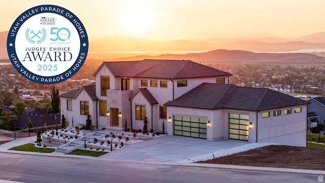 1171 E 430 S, Santaquin, UT 84655 - view of front facade featuring an attached garage, concrete driveway, a mountain view, and roof with shingles
