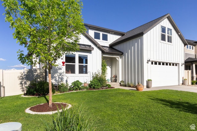 14949 S Billings Dr W Unit 119, Herriman, UT 84096 - modern farmhouse style home with board and batten siding, a standing seam roof, concrete driveway, metal roof, and a garage