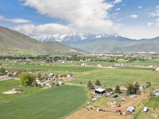 view of mountain backdrop featuring rural landscape