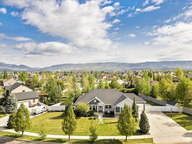 aerial perspective of suburban area featuring mountains