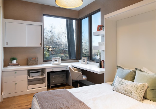 bedroom with light wood-type flooring