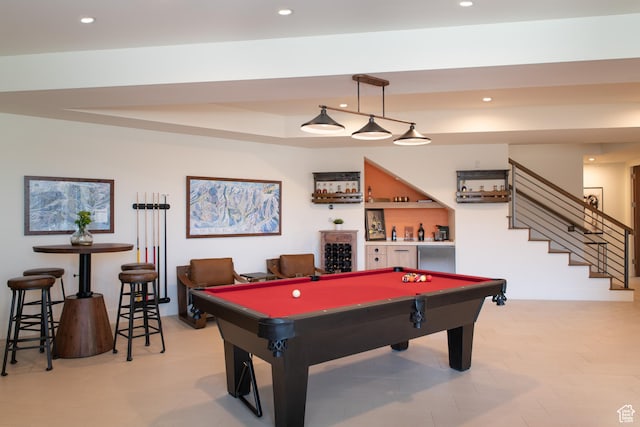 game room with a bar, pool table, and recessed lighting