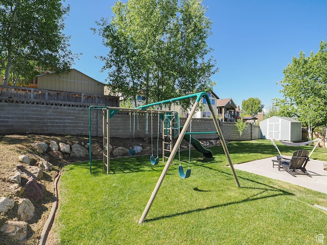 view of playground featuring a patio area