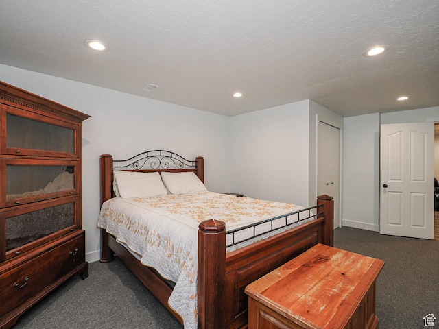 bedroom with dark colored carpet, recessed lighting, and baseboards