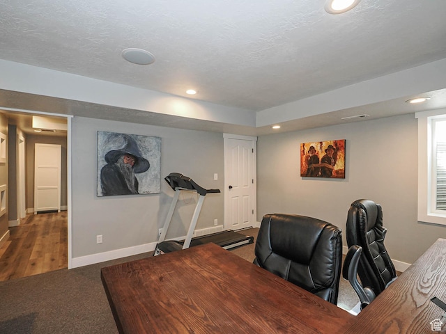 carpeted home office featuring recessed lighting and baseboards