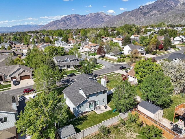 aerial perspective of suburban area featuring a mountainous background