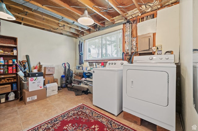 2068 S 200 E, Bountiful, UT 84010 - washroom with washer and clothes dryer and light tile patterned flooring