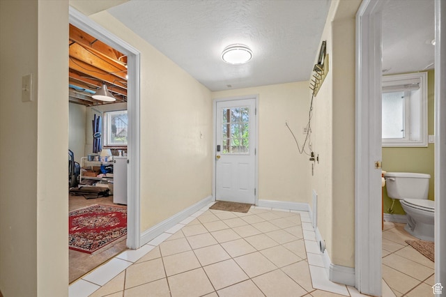 2068 S 200 E, Bountiful, UT 84010 - foyer featuring light tile patterned floors and baseboards