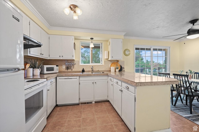 2068 S 200 E, Bountiful, UT 84010 - kitchen featuring white appliances, under cabinet range hood, a peninsula, white cabinets, and tile countertops