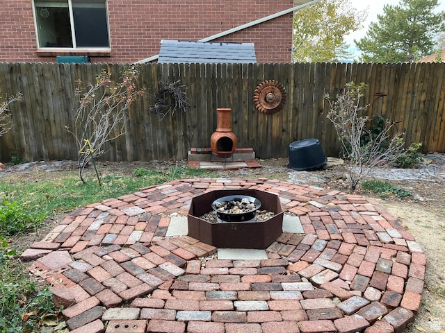 2068 S 200 E, Bountiful, UT 84010 - fenced backyard with a patio and a fire pit