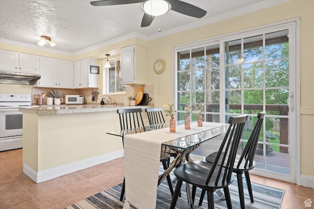 2068 S 200 E, Bountiful, UT 84010 - dining area with healthy amount of natural light, ceiling fan, light tile patterned flooring, and ornamental molding