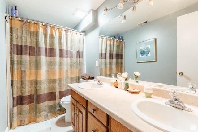 bathroom with toilet, double vanity, tile patterned flooring, and a shower with shower curtain