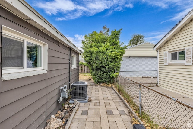4587 W 5100 S, Kearns, UT 84118 - fenced backyard featuring central AC unit and a patio area