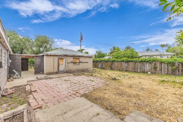 4587 W 5100 S, Kearns, UT 84118 - view of yard featuring a patio