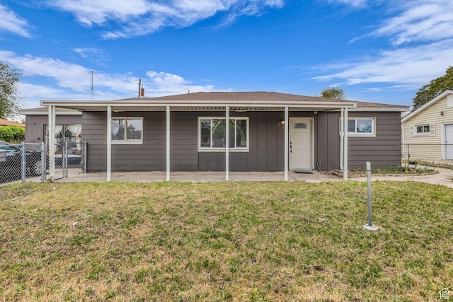 4587 W 5100 S, Kearns, UT 84118 - view of front facade with a patio area and board and batten siding