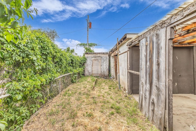 4587 W 5100 S, Kearns, UT 84118 - view of yard featuring a storage shed