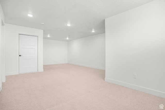 1631 W Century Ln Unit A, Mapleton, UT 84664 - below grade area featuring recessed lighting, light colored carpet, baseboards, and a textured ceiling